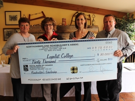 (from left to right) – Joanne Farrell, Awards Officer at Loyalist College, Maureen Piercy, Loyalist College President, Denise Marshall, Project Engineer with Northumberland County, and John Cane, President of Northumberland Road Builders Association.